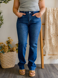 Mid Rise Raw Hem Bootcut Jeans